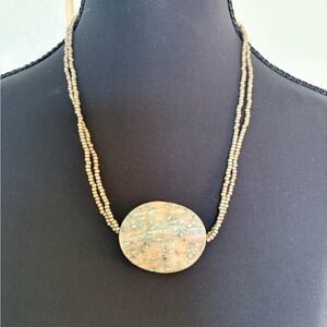 Elegant Beaded Necklace with Stone Pendant